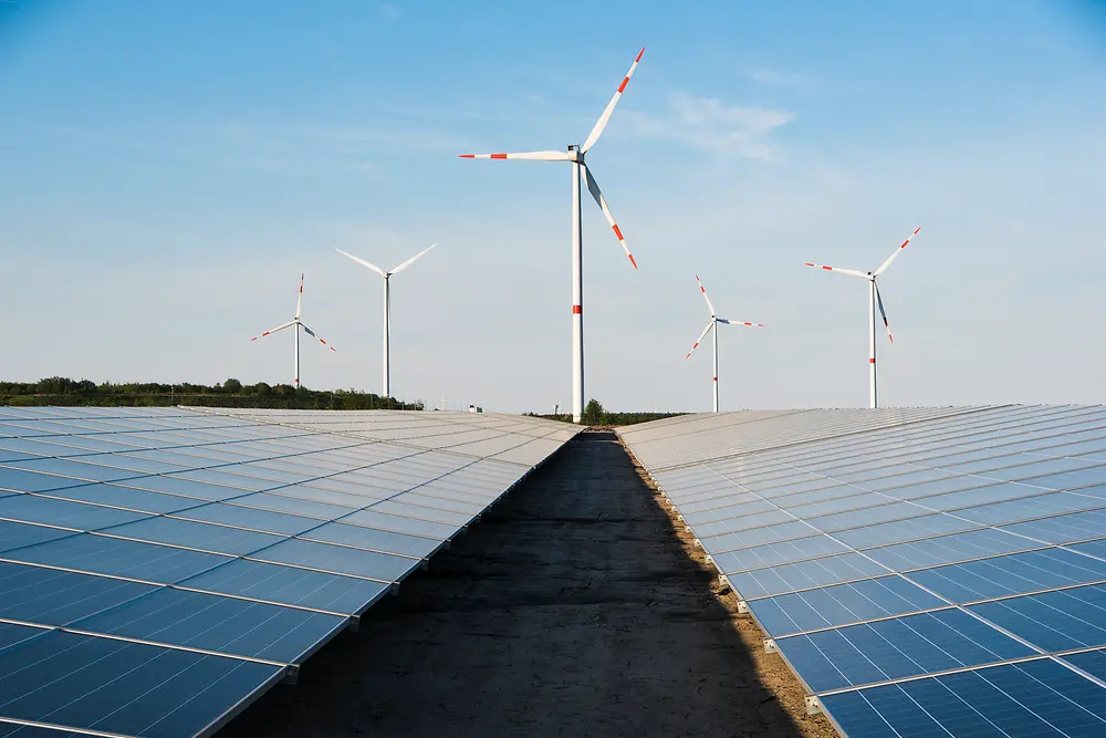 Five windmills and two solar panels