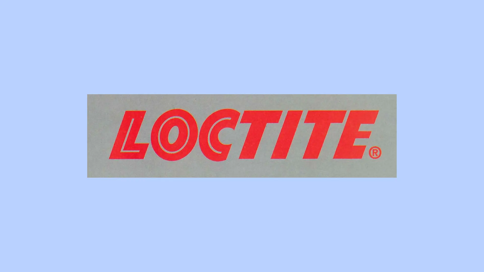 Il logo rosso Loctite su sfondo grigio.