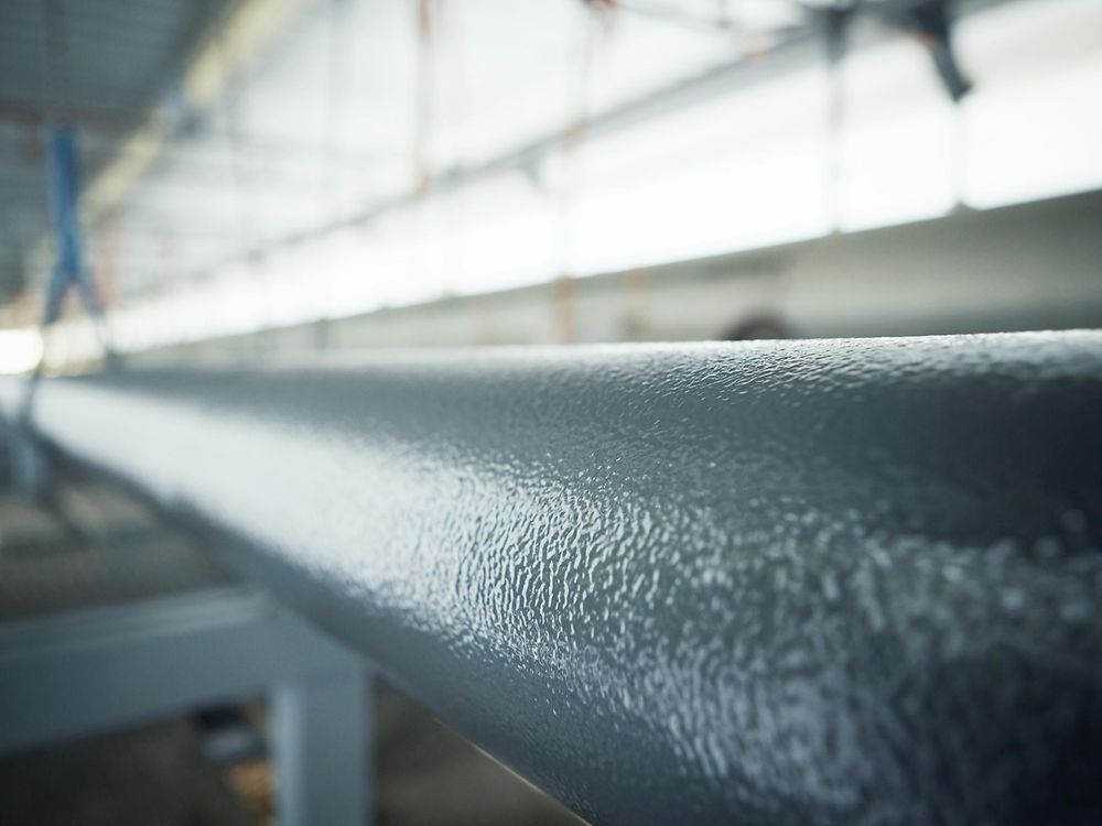 A steel pipe after coating with Loctite PC 7255 sprayable ceramic topcoat